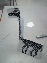 A drawing of a girafe adds a third dimension